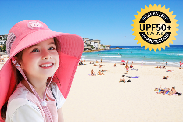 It’s summer kids protected from the sun at the beach and outdoors shading protective hats. These hats have a very wide brim of 10.5cm, plus a long neck cover. approved UPF50+ sun protection. Breathable and quick dry material means comfortable to wear all day. Ponytail hole for comfort Plain pink and blue hats , fun for the kids Adjustable head straps  LucyMelon Amazebear Cancer Council Australia Legionnaires